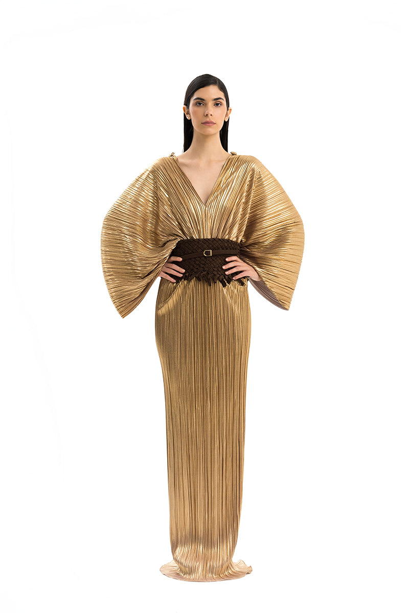 Elegant CANDELA gown by Maylé Vásquez featuring flowing fabric and intricate detailing for formal occasions.
