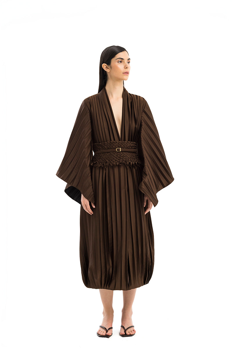 Maylé Vásquez CALADO belt with woven design, brown leather strap, and buckle detail, displayed on a neutral background.