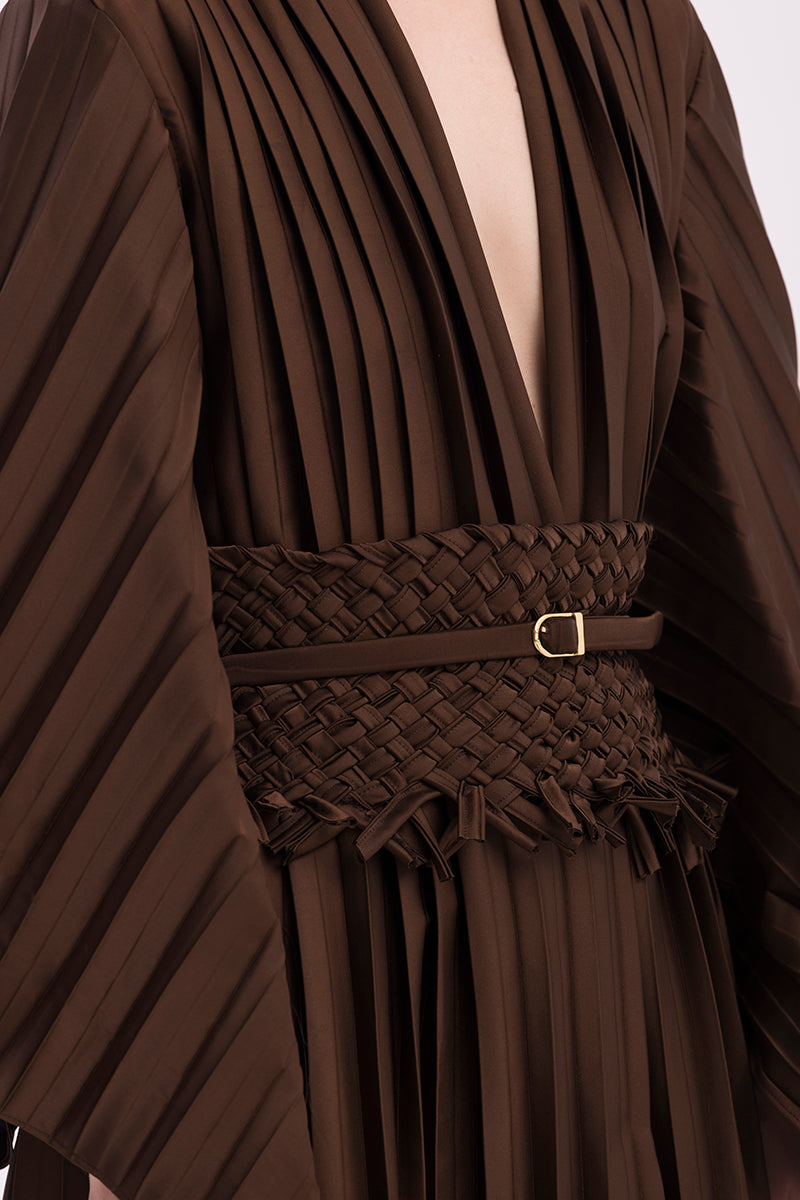 Maylé Vásquez CALADO belt featuring intricate woven design and leather strap, stylish accessory for casual or formal wear.