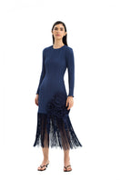 Maylé Vásquez Rio midi dress displayed on a model, featuring elegant design and stylish fabric for a chic summer look.