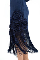 Maylé Vásquez RIO midi dress featuring a stylish design, perfect for casual or formal occasions, displayed on a hanger.
