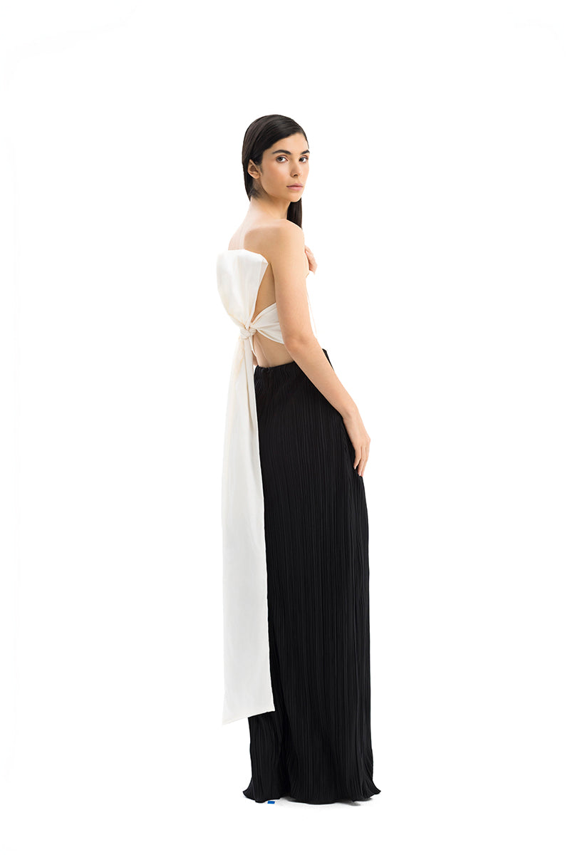 Maylé Vásquez Canela Two Tone Maxi Dress featuring a flowing silhouette and stylish color block design.