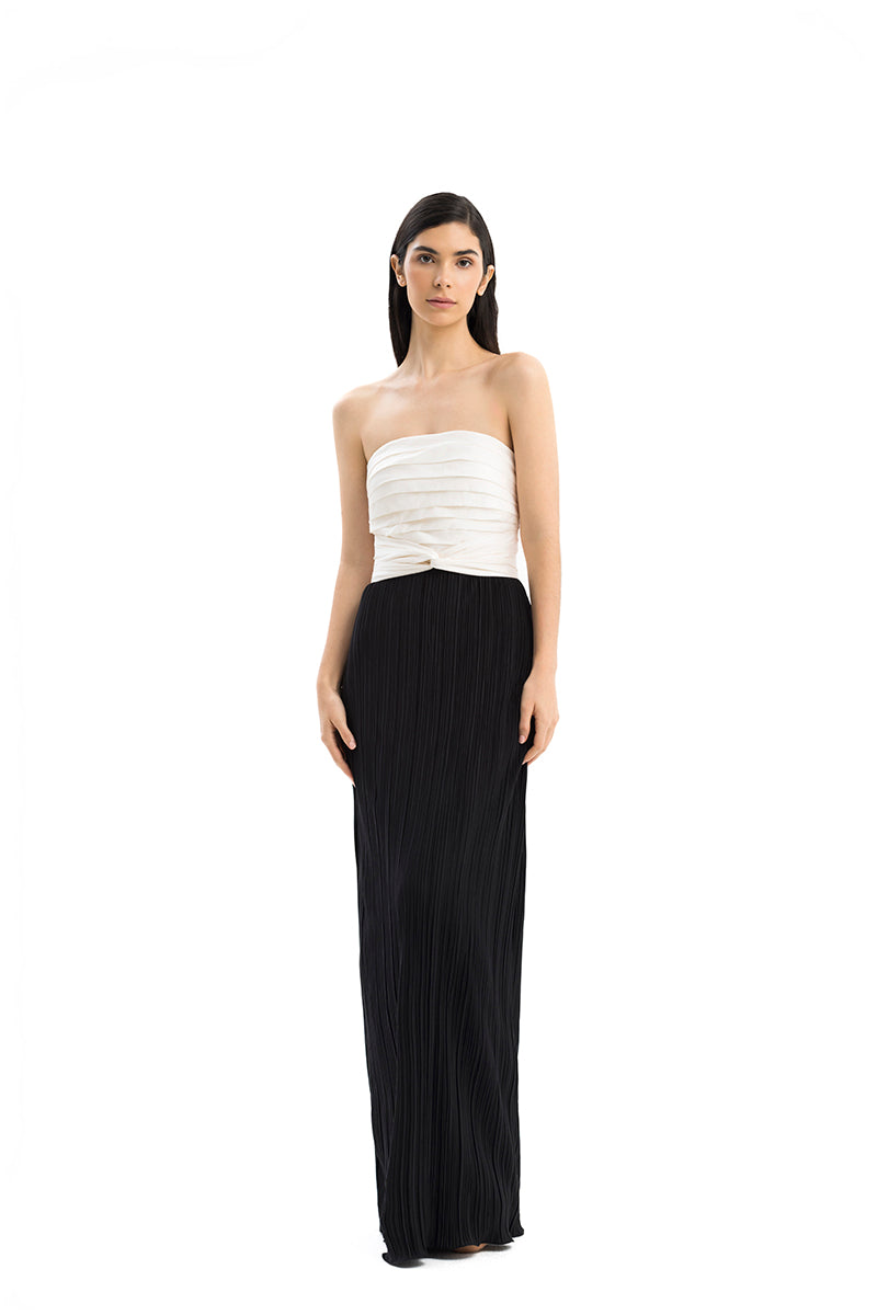 Maylé Vásquez Canela Two Tone Maxi Dress featuring a flowing, two-tone fabric design perfect for elegant occasions.