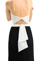 Maylé Vásquez Canela Two Tone Maxi Dress showing a flowing, sleeveless dress with a two-tone design and elegant silhouette.