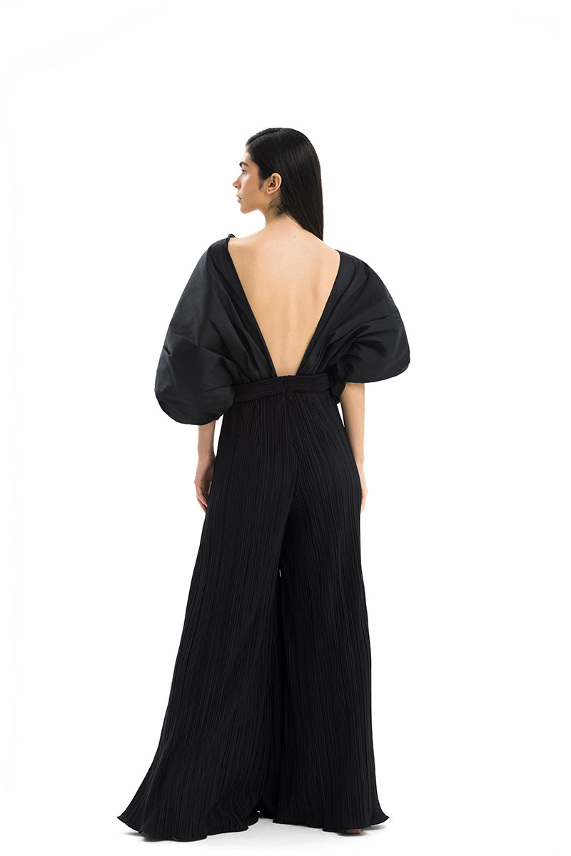Maylé Vásquez Sombra Palma jumpsuit displayed on a model, featuring a stylish, fitted design perfect for casual or semi-formal wear.