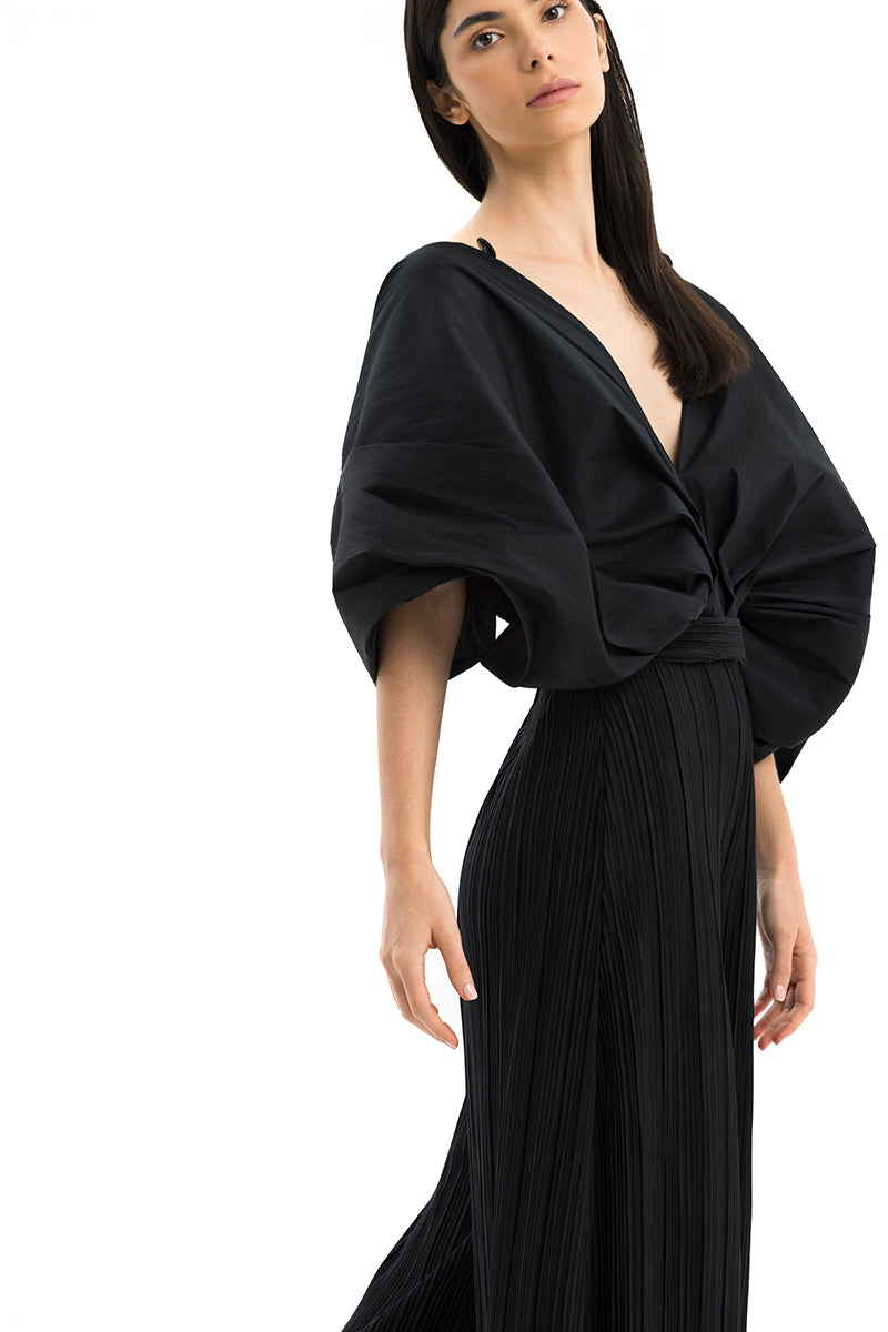 Maylé Vásquez Sombra Palma jumpsuit featuring a stylish design, lightweight fabric, and modern silhouette.