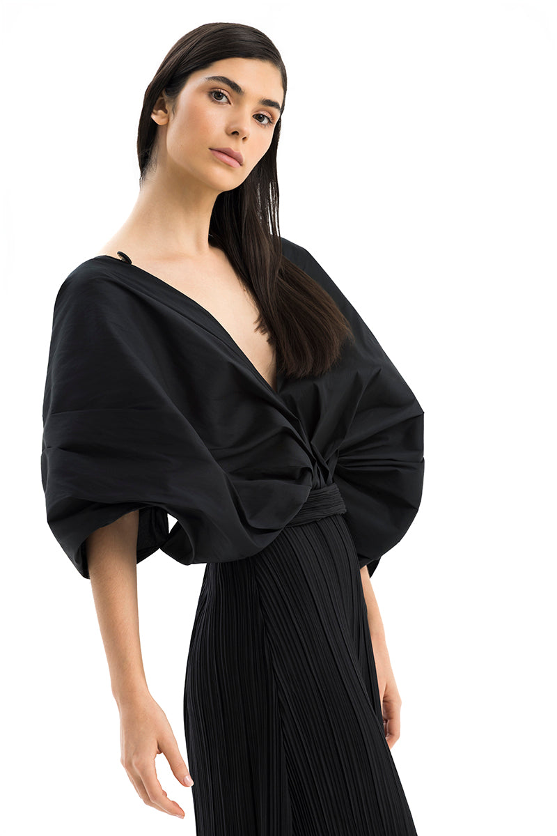 Maylé Vásquez Sombra Palma jumpsuit, stylish one-piece with a relaxed fit, featuring a vibrant pattern and wide-leg design.