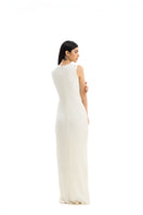 Flowy Costa Clara maxi dress by Maylé Vásquez, showcasing a vibrant, elegant design with a flowing silhouette and stylish details.