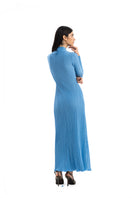 Elegant Maylé Vásquez Aborigen maxi dress with intricate patterns, flowing fabric, and vibrant colors for a stylish bohemian look.