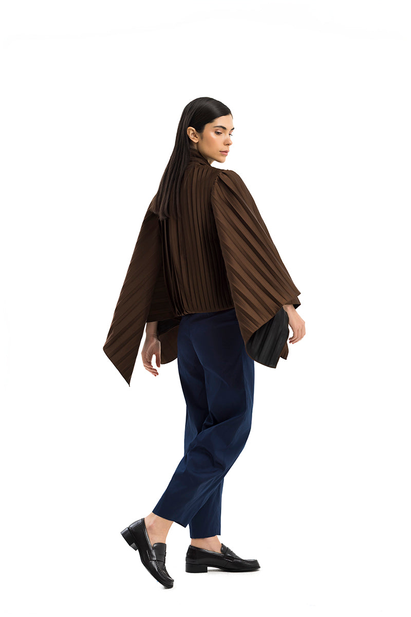 Brown COSTE NORTA jacket by Maylé Vásquez, shown in a stylish fit with textured fabric and classic design.