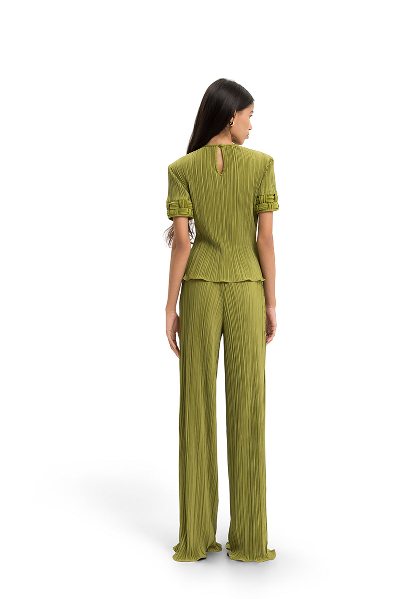 Maylé Vásquez SABIA top displayed on a hanger, featuring a stylish design and lightweight fabric perfect for casual wear.