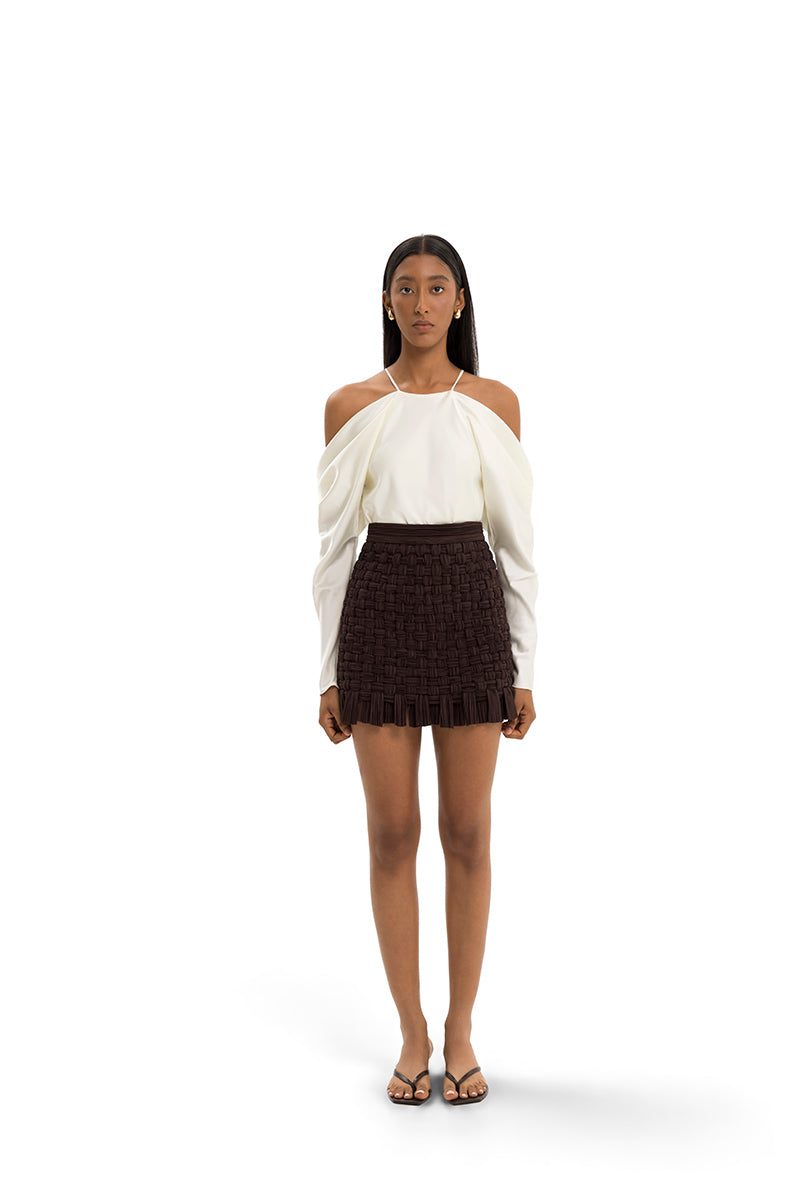 Maylé Vásquez YARA mini skirt with stylish design, featuring a fitted silhouette and trendy fabric for casual or dressy looks.
