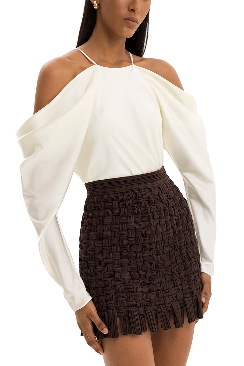 Maylé Vásquez YARA mini skirt in stylish fabric, featuring a trendy design perfect for casual or dressy occasions.