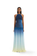 Maylé Vásquez Sirena gown, a stylish blue maxi dress with flowing fabric and elegant design, perfect for formal occasions.