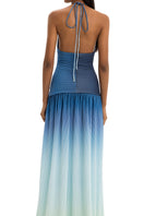 Maylé Vásquez Sirena Gown maxi dress in flowing fabric with intricate detailing, elegant design perfect for formal occasions.