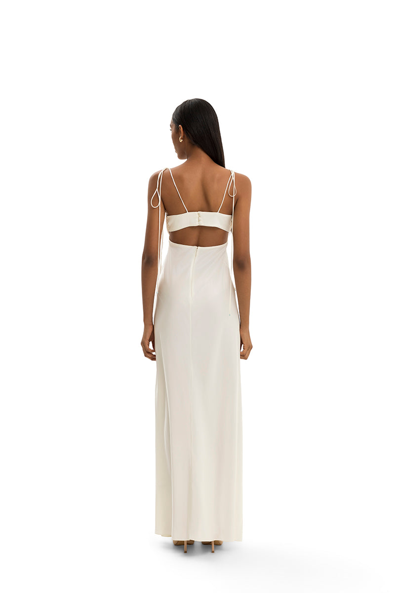 Elegant Maylé Vásquez Concha Dress gown with intricate detailing, flowing fabric, and stylish design for formal occasions.