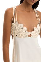 Maylé Vásquez Concha Dress gown featuring elegant fabric and intricate detailing, perfect for formal occasions.