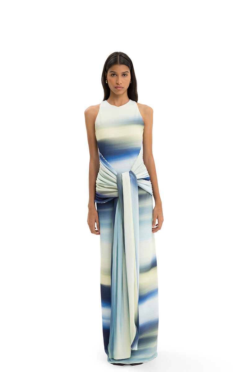 Maylé Vásquez Consta maxi dress featuring flowing fabric and elegant design, perfect for summer or special occasions.