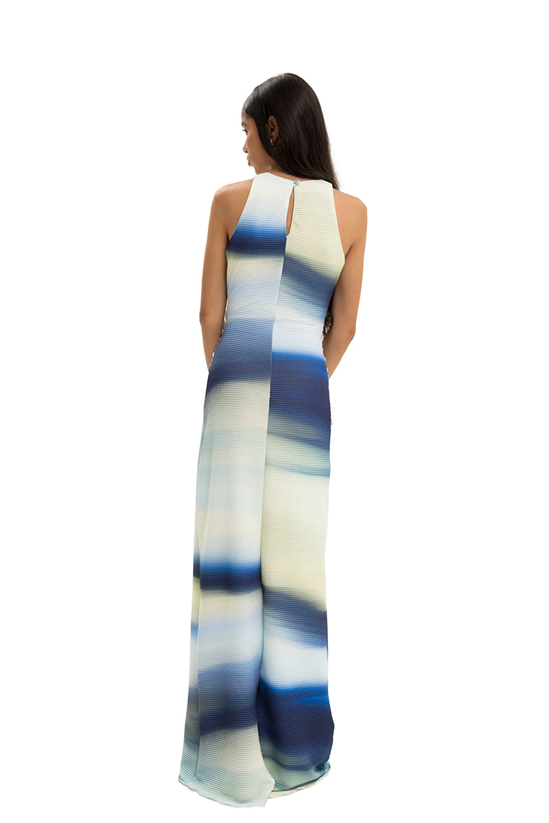 Long floral maxi dress by Maylé Vásquez featuring a flowing silhouette and elegant design.