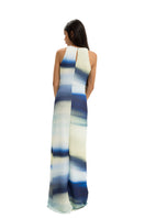 Maylé Vásquez CONSTA maxi dress featuring flowing fabric and elegant design, suitable for casual and formal occasions.