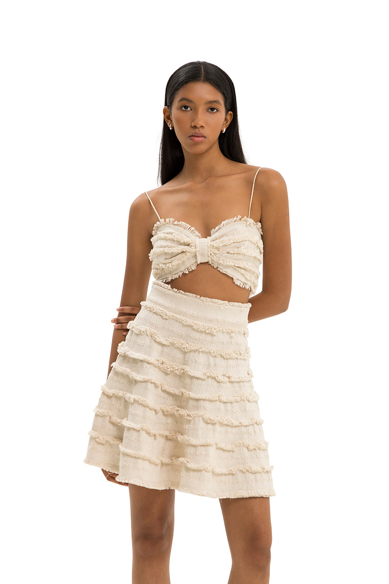 Maylé Vásquez ALYA mini skirt in nature print, lightweight fabric, fitted waist, and above-the-knee length, stylish and casual.