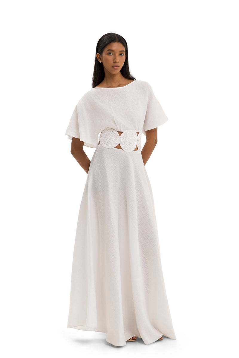 Elegant circle gown by Maylé Vásquez featuring flowing fabric and a stylish silhouette, perfect for formal occasions.