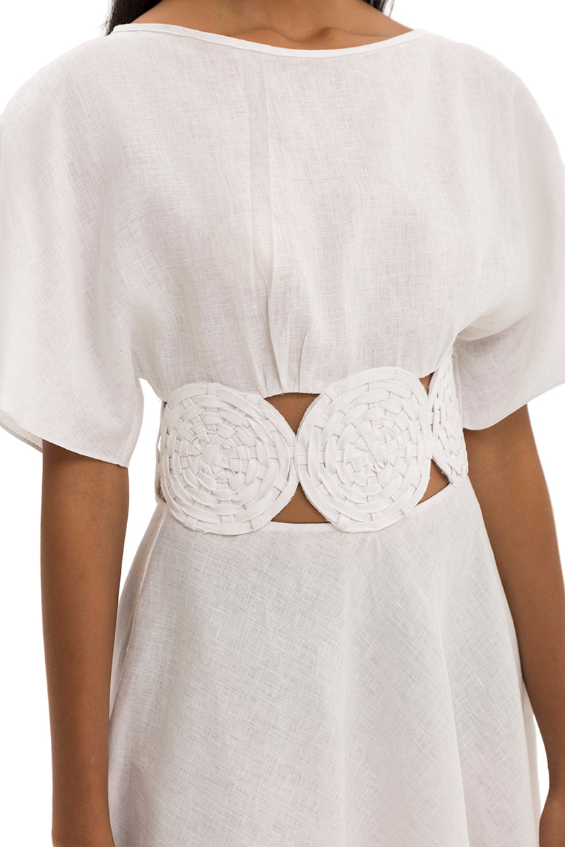Elegant circle gown by Maylé Vásquez featuring flowing fabric and a stylish design, perfect for formal occasions.