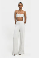 Silver VELO pants by Maylé Vásquez, stylish and comfortable pants with a sleek fit, shown in the image.