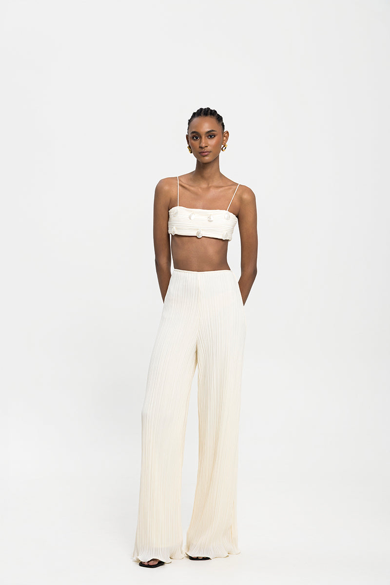 Maylé Vásquez VELO pants showing a stylish, tailored design with a comfortable fit, in a neutral color.