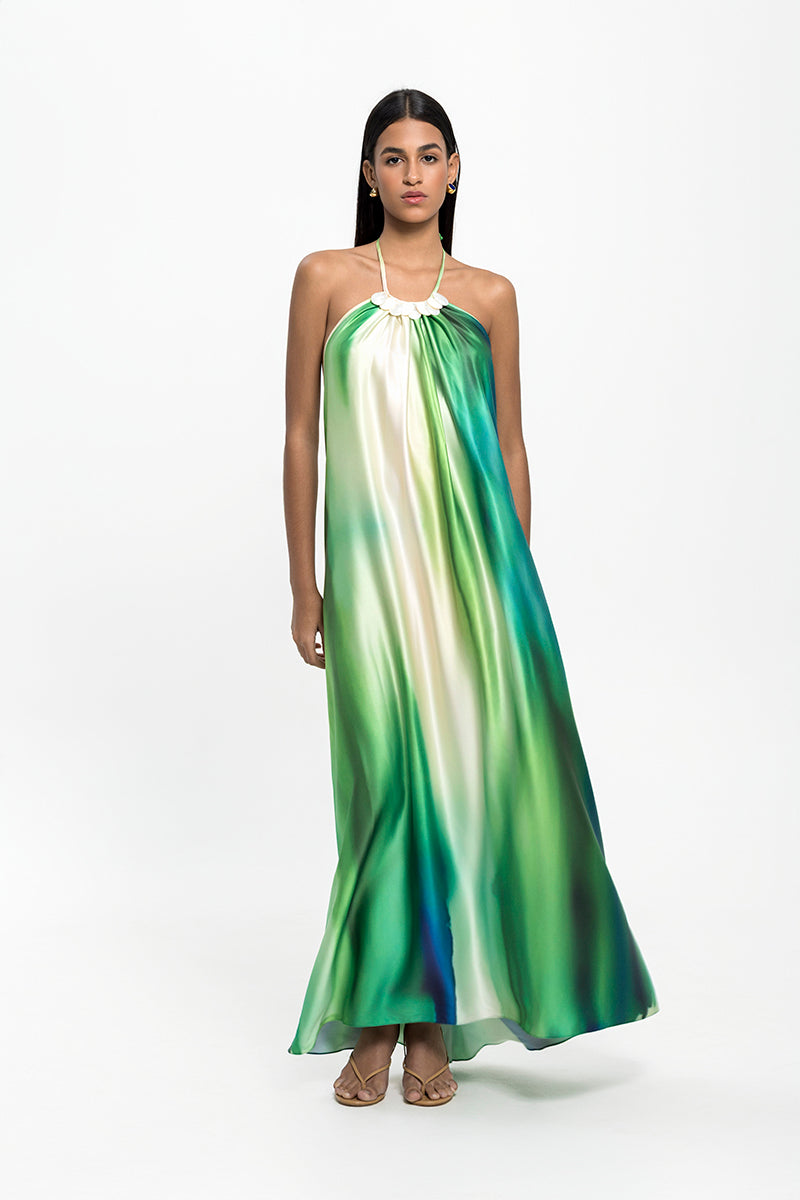 Maylé Vásquez CANTO Maxi Dress with flowing fabric and elegant design, perfect for summer or special occasions.