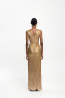 Maylé Vásquez ORO Maxi Dress featuring flowing fabric and elegant design, perfect for casual or formal occasions.