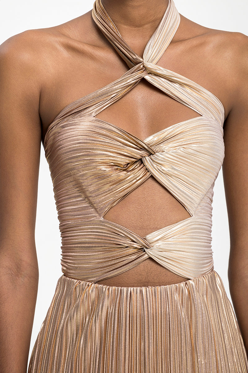 Maylé Vásquez DORADO Maxi Dress featuring flowing fabric and elegant design, perfect for summer or special occasions.