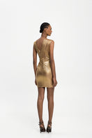 Maylé Vásquez ORO mini dress showing a stylish short dress with elegant design and fabric detail.