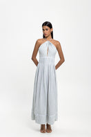 Maylé Vásquez Pilar Maxi Dress in Summer Dreams with floral pattern and flowing fabric, perfect for warm weather.