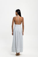 Maylé Vásquez Pilar summer maxi dress with floral pattern, flowing fabric, and sleeveless design perfect for warm weather.