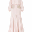 Light pink Nihan Peker Maysa gown with elegant flowy fabric and subtle detailing, perfect for formal occasions.