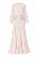 Light pink Nihan Peker Maysa gown with elegant flowy fabric and subtle detailing, perfect for formal occasions.