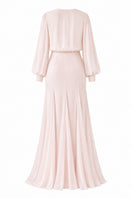 Light pink Maysa gown by Nihan Peker featuring elegant draping and a flowing silhouette.