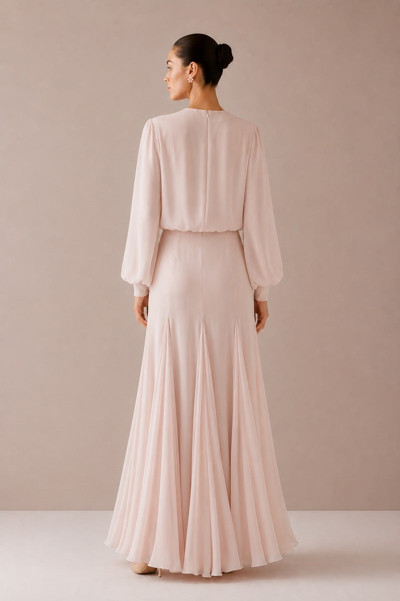 Light pink Nihan Peker MAYSA gown, elegant evening dress with flowing fabric and intricate design details.