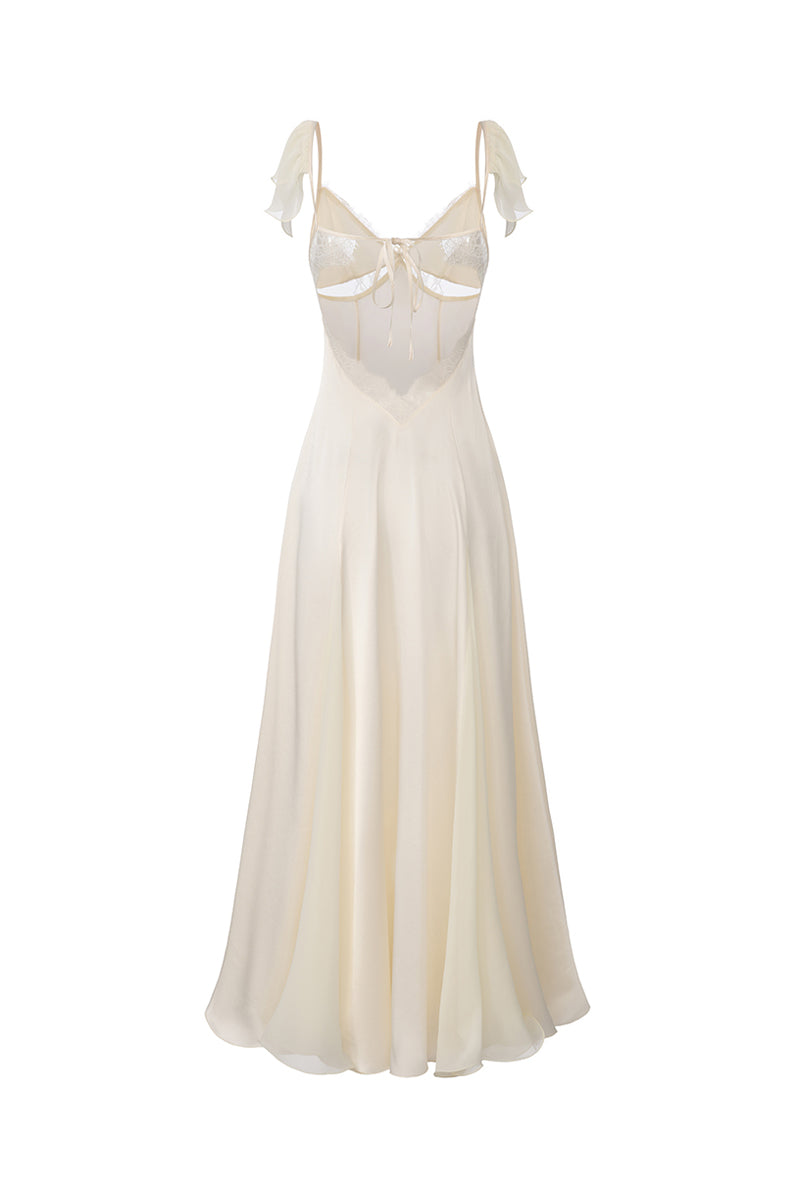 Nana Jacqueline Meadow dress, champagne maxi dress with open back and flowing fabric, perfect for elegant occasions.