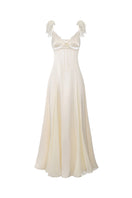 Nana Jacqueline Meadow dress, champagne maxi dress with an open back, flowing fabric, and elegant design.