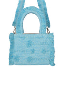 Medium Poka Bali top handle bag by Bani featuring a stylish woven design and sturdy handle on a neutral background.
