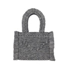 Medium Bani Poka Gardo top handle bag with sleek design and sturdy handle, perfect for stylish everyday use.