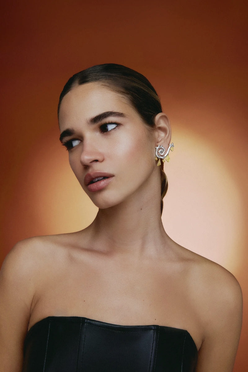 Silver Medusa earrings by Jude Benhalim featuring detailed snake head designs, hanging dangle style jewelry.