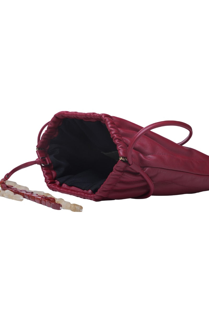 Red Melissa leather clutch bag by Double A, stylish shoulder bag with sleek design and elegant finish.