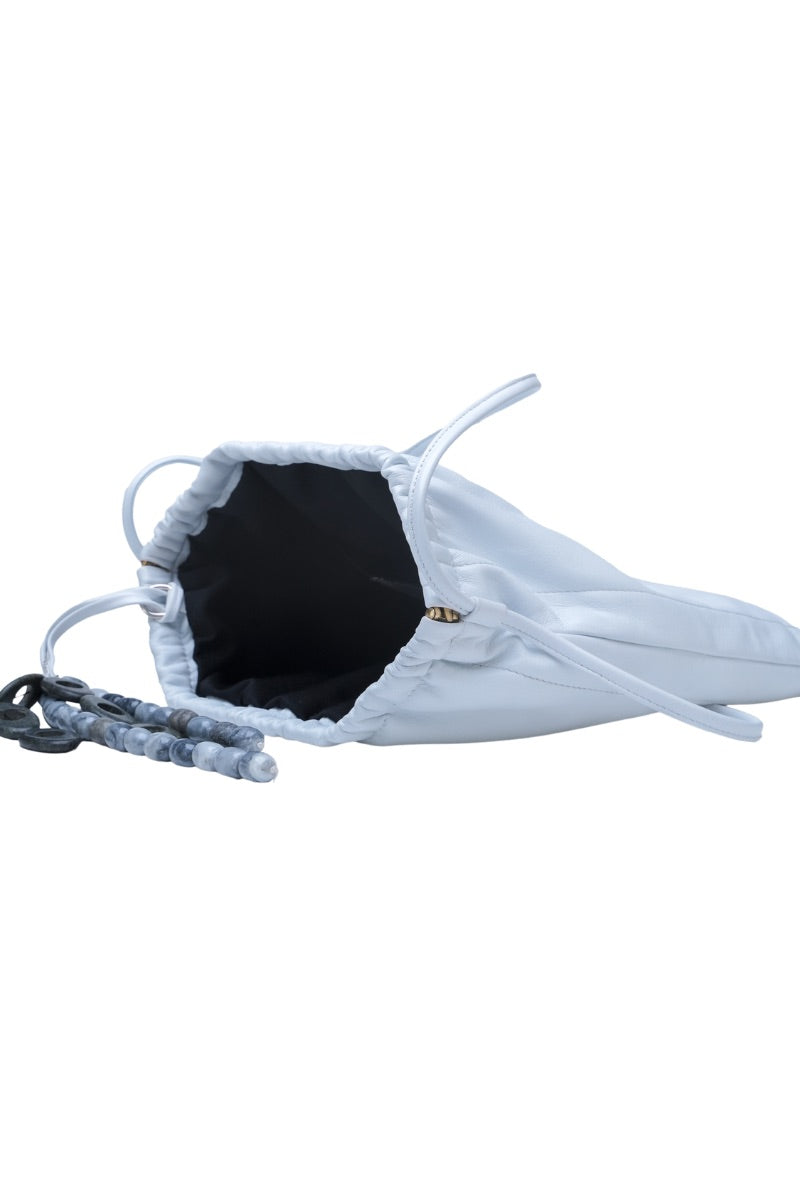 White Melissa clutch leather bag by Double A, featuring a sleek design and compact style for elegant carry.
