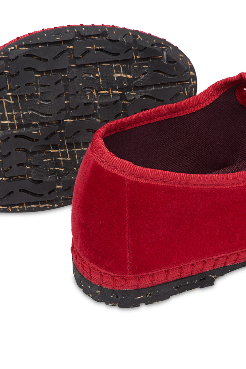 Flabelus Mellark red flats with matching red piping, stylish slip-on shoes on a neutral background.