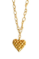 Gold melted heart necklace by Oz Objects, featuring a unique, abstract heart pendant on a delicate chain.