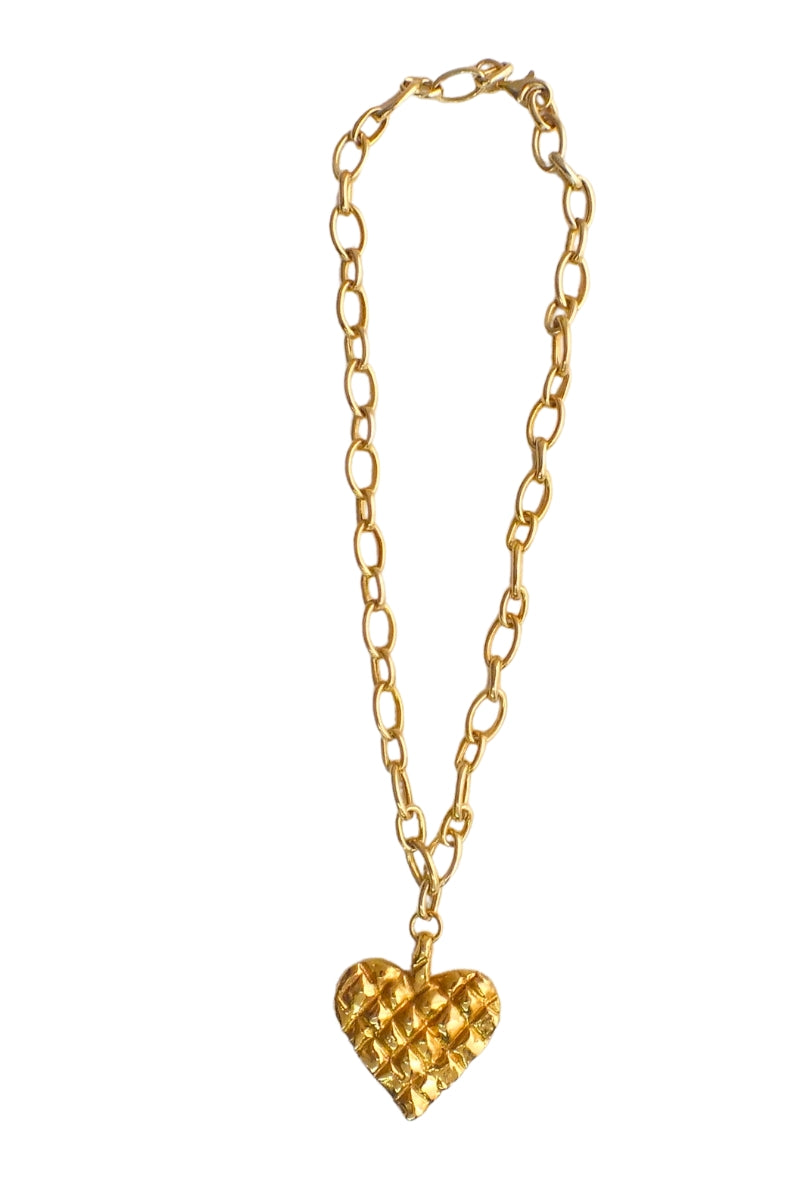 Gold melted heart necklace by Oz Objects featuring a modern, abstract heart pendant on a delicate chain.