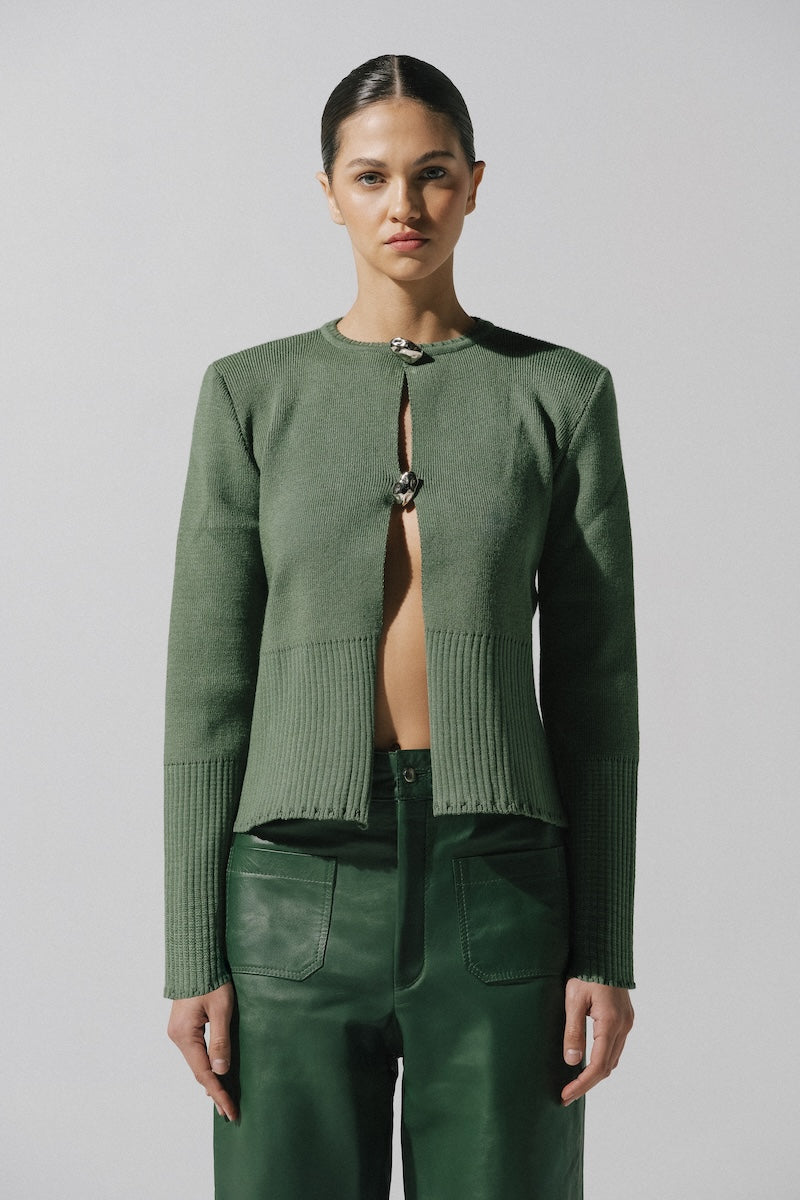 Baobab Meraky sweater in sage green, cozy knit sweater with a relaxed fit, long sleeves, and ribbed cuffs.